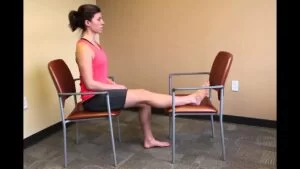Hamstring stretch with use of chair