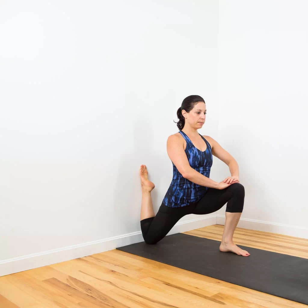 Hip flexor stretch while kneeling