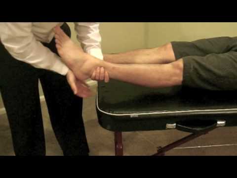 Heel thump test of  the ankle in supine position
