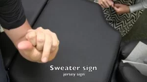 Sweater Finger Sign test