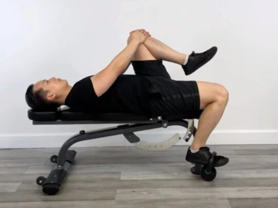 Supine kettlebell hip march (easy)