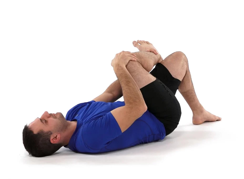 Ankle-over-knee piriformis stretch