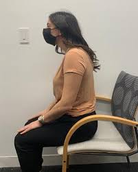 seated or standing neck retraction